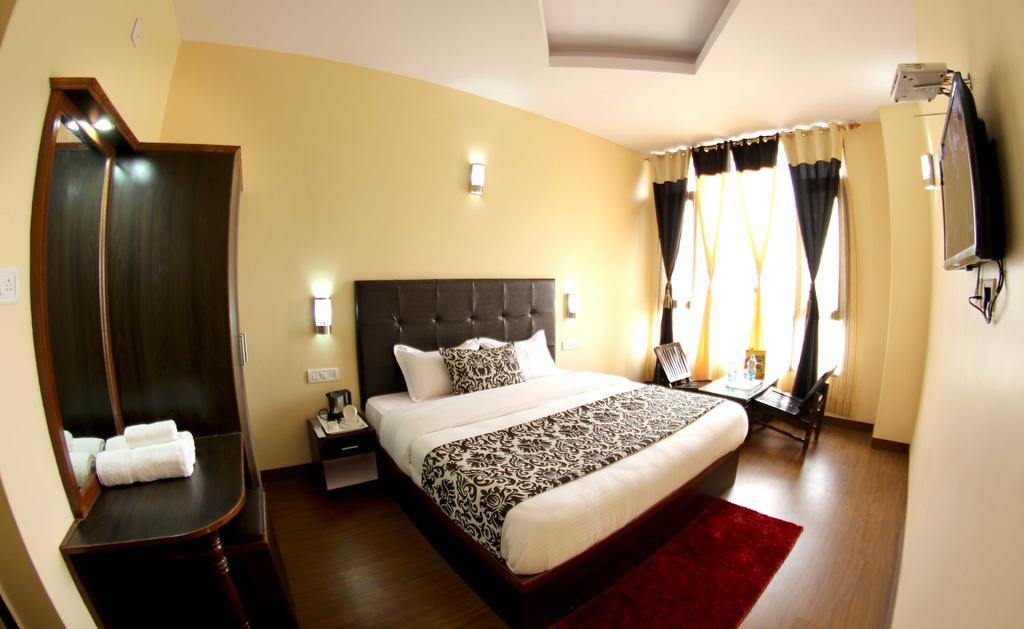 The Grand Welcome Hotel Simlá Szoba fotó