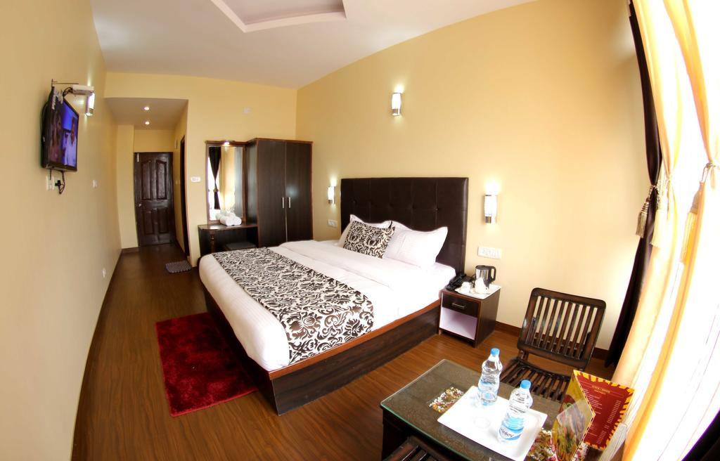 The Grand Welcome Hotel Simlá Szoba fotó