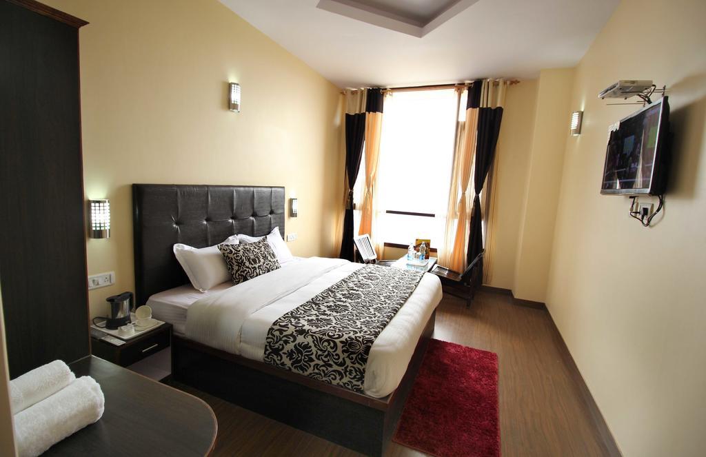The Grand Welcome Hotel Simlá Szoba fotó